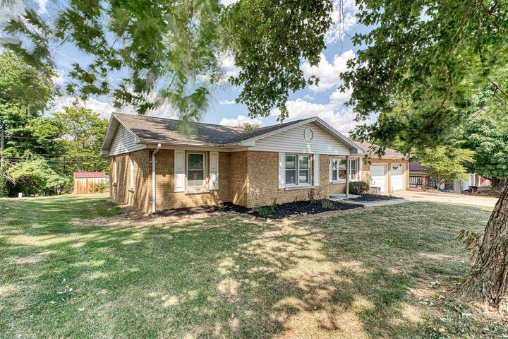Property Photo:  1613 Country Club Road  IN 47620 