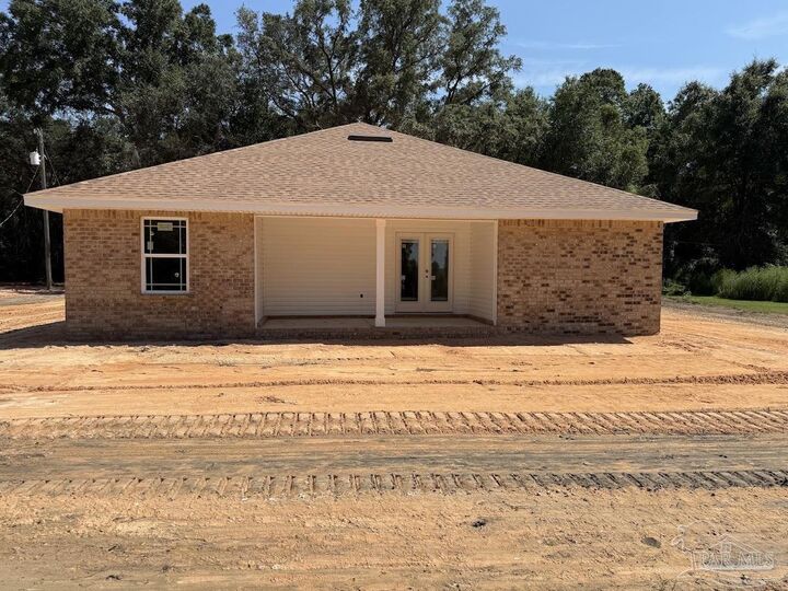 Property Photo: 7610 Homerun Rd FL 32583