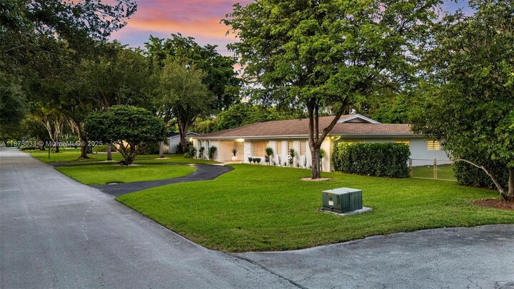 Property Photo:  12205 SW 69th Pl  FL 33156 