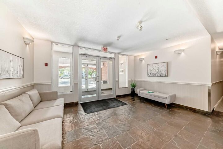 Property Photo:  2 Hemlock Crescent SW 214  AB T3C 2Z1