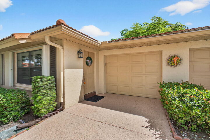 Property Photo:  4555 Apple Tree Circle A  FL 33436 