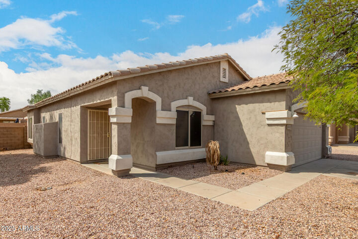 Property Photo: 30332 N Desert Willow Boulevard AZ 85143