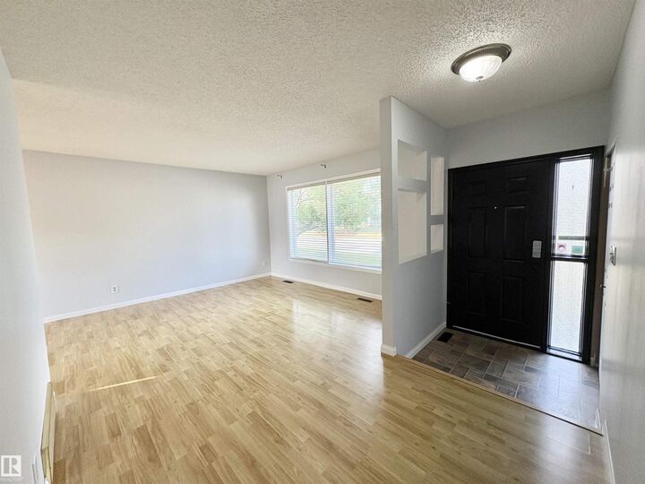 Property Photo:  12231 44 St NW NW  AB T5W 4Z5 