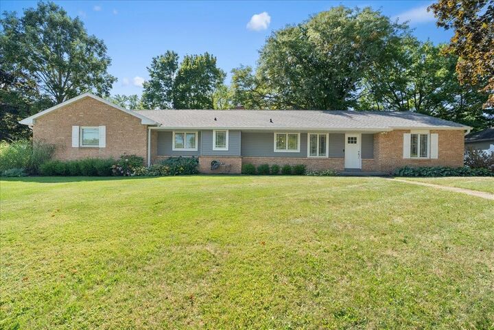 Property Photo: 1104 Riverside Drive MI 48867