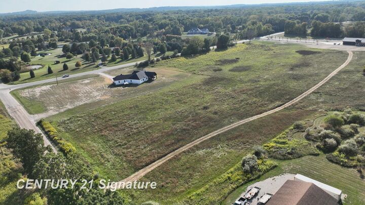 Property Photo:  9480 Irish Road  MI 48438 