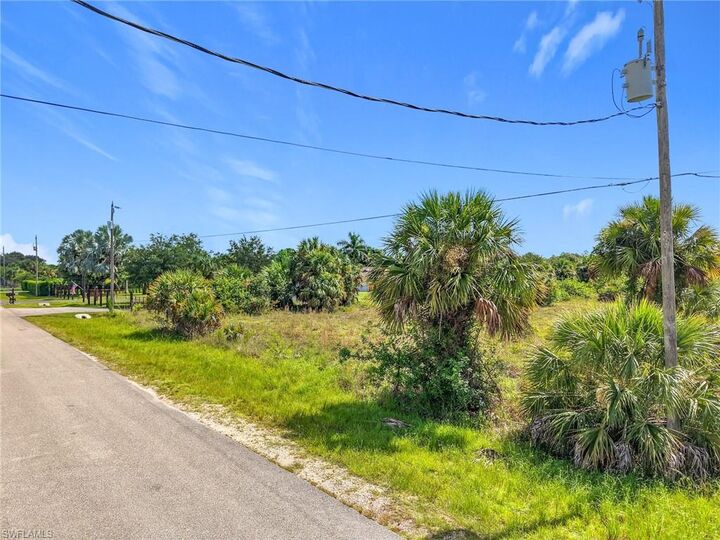 Property Photo:  10th St NE  FL 34120 