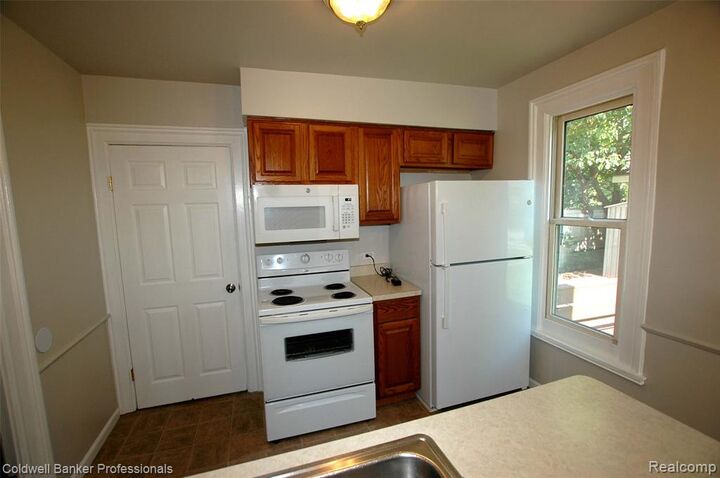 Property Photo: 706 N Main Street MI 48446 1927