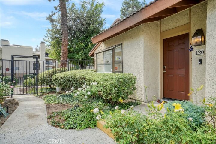 Property Photo:  21551 Burbank 120  CA 91367 