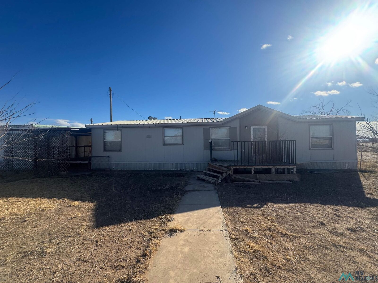 Property Photo:  903 Beckett Street  NM 88250 
