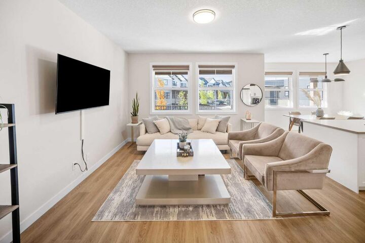 Property Photo:  201 Cooperswood Green SW 204  AB T3B 3Y6 