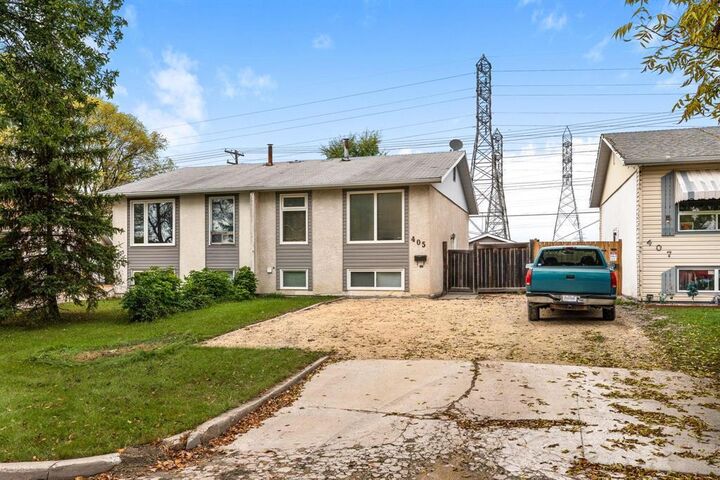 Property Photo:  405 Dowling Avenue East  MB R2C 3M4 