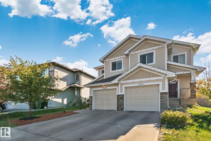 Property Photo:  17629 7A Avenue SW  AB T6W 2W1 