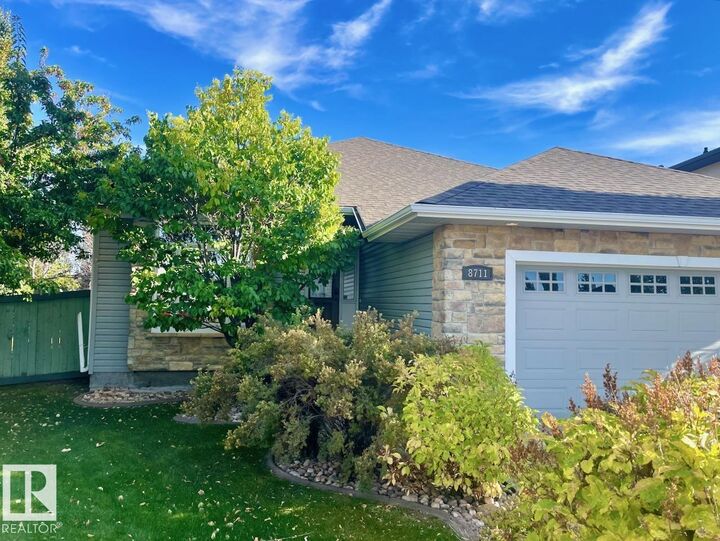 Property Photo:  8711 208 Street NW  AB T5T 6Y2 