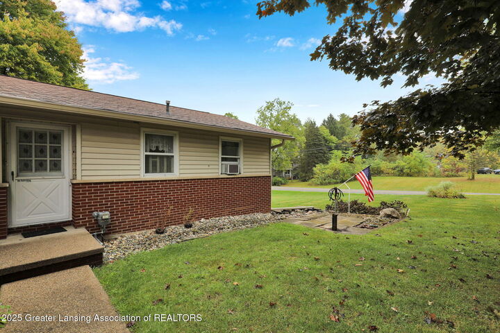 Property Photo:  1404 W Stoll Road  MI 48820 