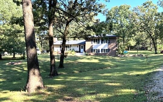 Property Photo:  20193 SW Oakwood Drive  MO 65536