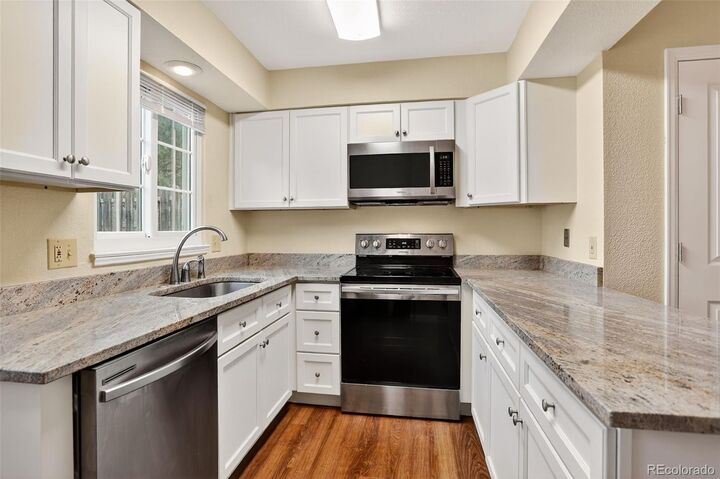 Property Photo:  8850 W Dartmouth Place  CO 80227 