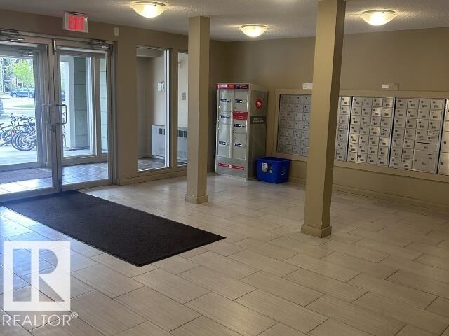 Property Photo: 111 Watt Common SW SW 220 AB T6X 2C6