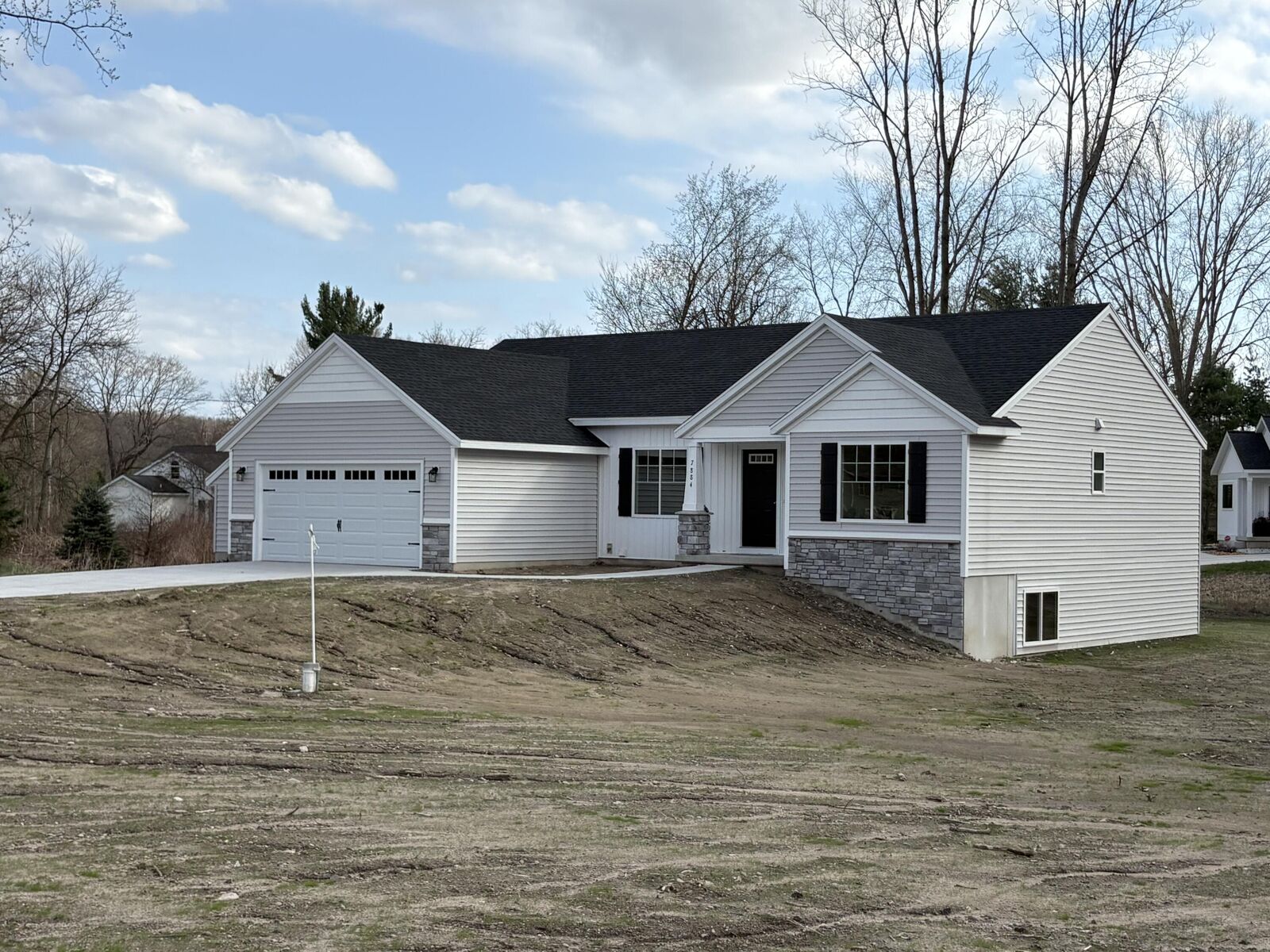 Property Photo:  7884 Cannonsburg Road NE  MI 49341 