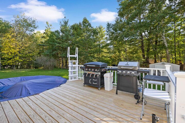 Property Photo:  115 Back River Road  NH 03054 