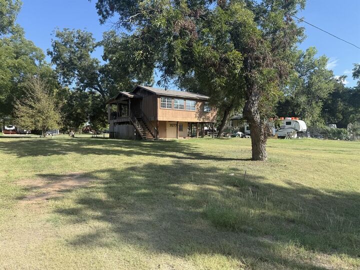 Property Photo: 7077 Cherokee Trail TX 76087