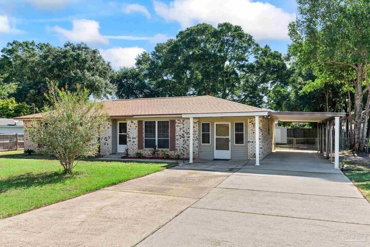 Property Photo:  5485 Mulat Rd  FL 32583 
