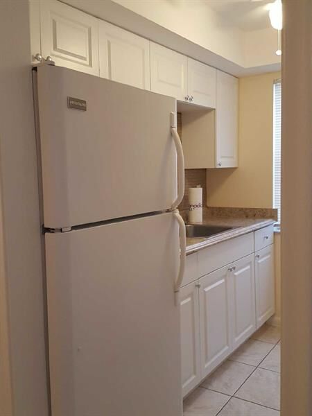 Property Photo: 104 SE 10th St 101 FL 33441