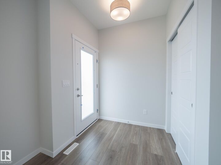 Property Photo: 114 Elliott Wynd AB T8L 1R8