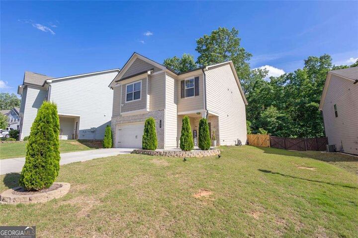 Property Photo:  104 Auburn Crossing Way  GA 30011 
