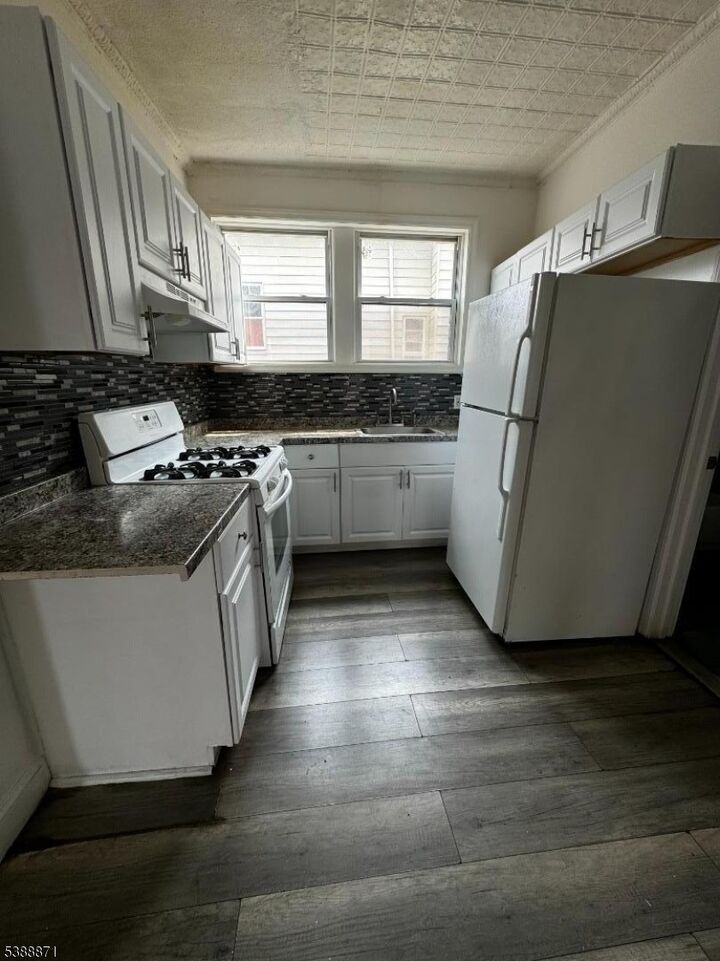 Property Photo:  434 E 26 St  NJ 07514 