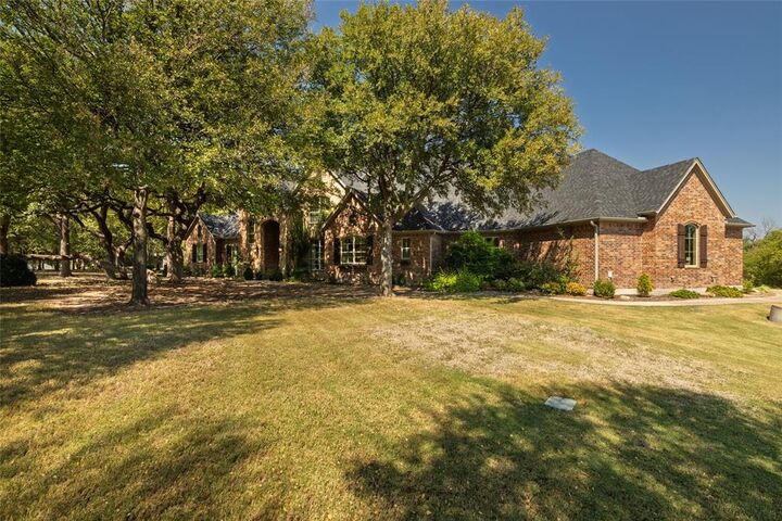 Photo de la propriété: 201 N Oakvista Court TX 76008