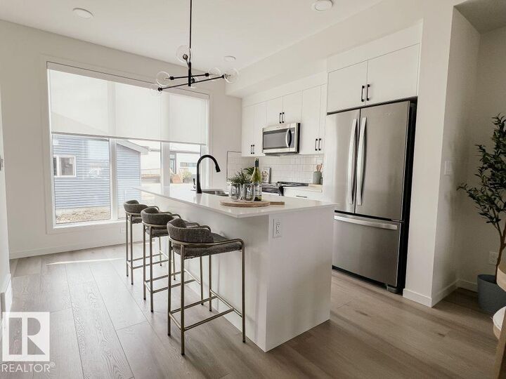 Property Photo:  7104 50A Avenue  AB T4X 3G5 