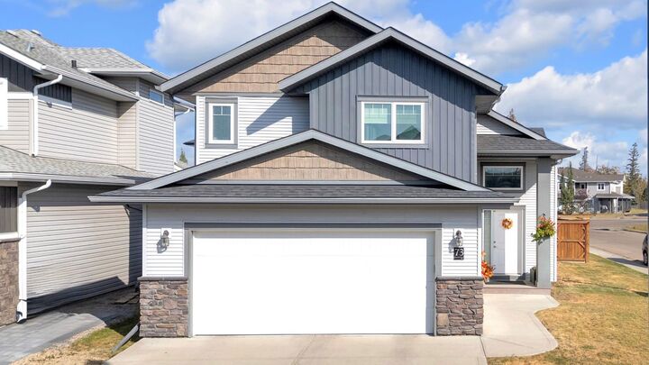 Property Photo:  73 Reynolds Road  AB T4S 0L8 