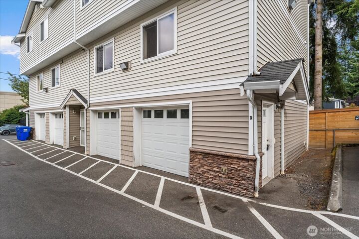 Property Photo: 6905 Rainier Dr E #2D WA 98203