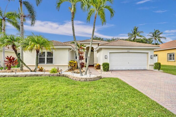 Property Photo:  5242 Indianwood Village Lane  FL 33463 