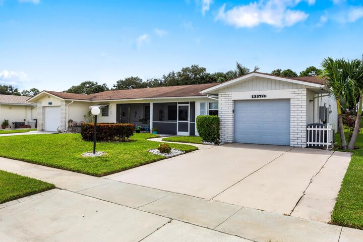 Property Photo:  13379 Via Vesta B  FL 33484 