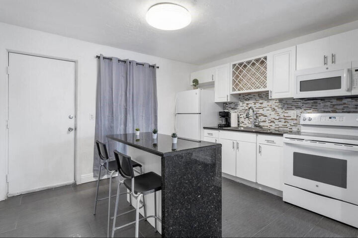 Property Photo:  1501 N Federal Highway 3  FL 33460 