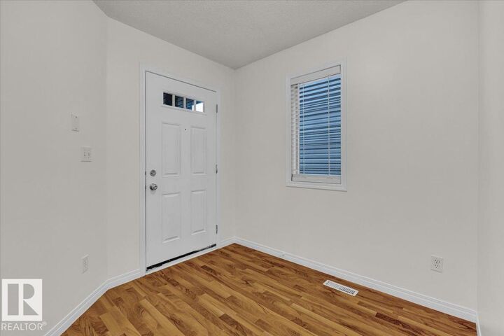 Property Photo: 104 21 Summerwood Drive AB T8H 0B4