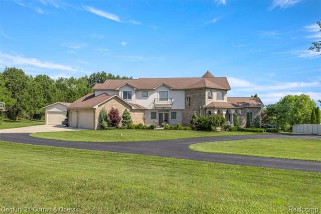 Property Photo: 7455 Groveland Road MI 48442