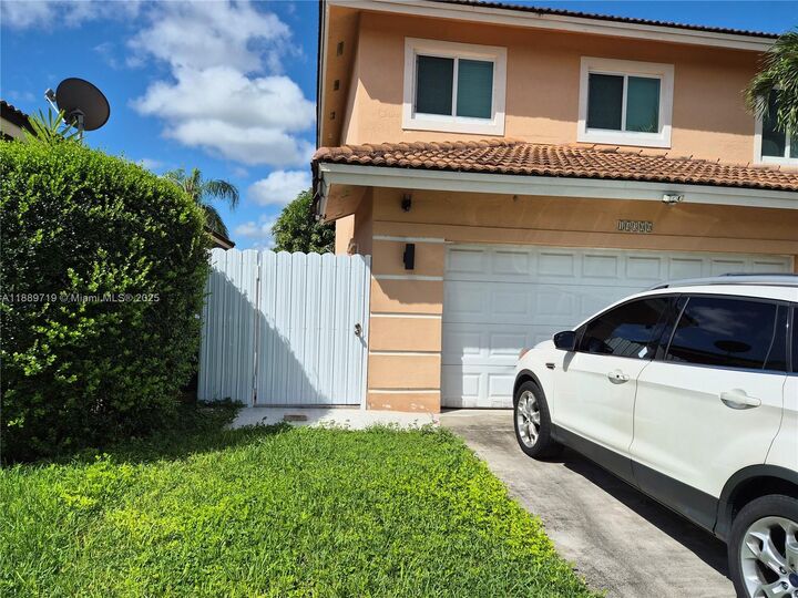 Property Photo:  14300 SW 161st Pl 1  FL 33196 