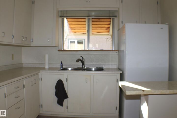 Property Photo: 13011 109 Avenue NW AB T5M 2G1