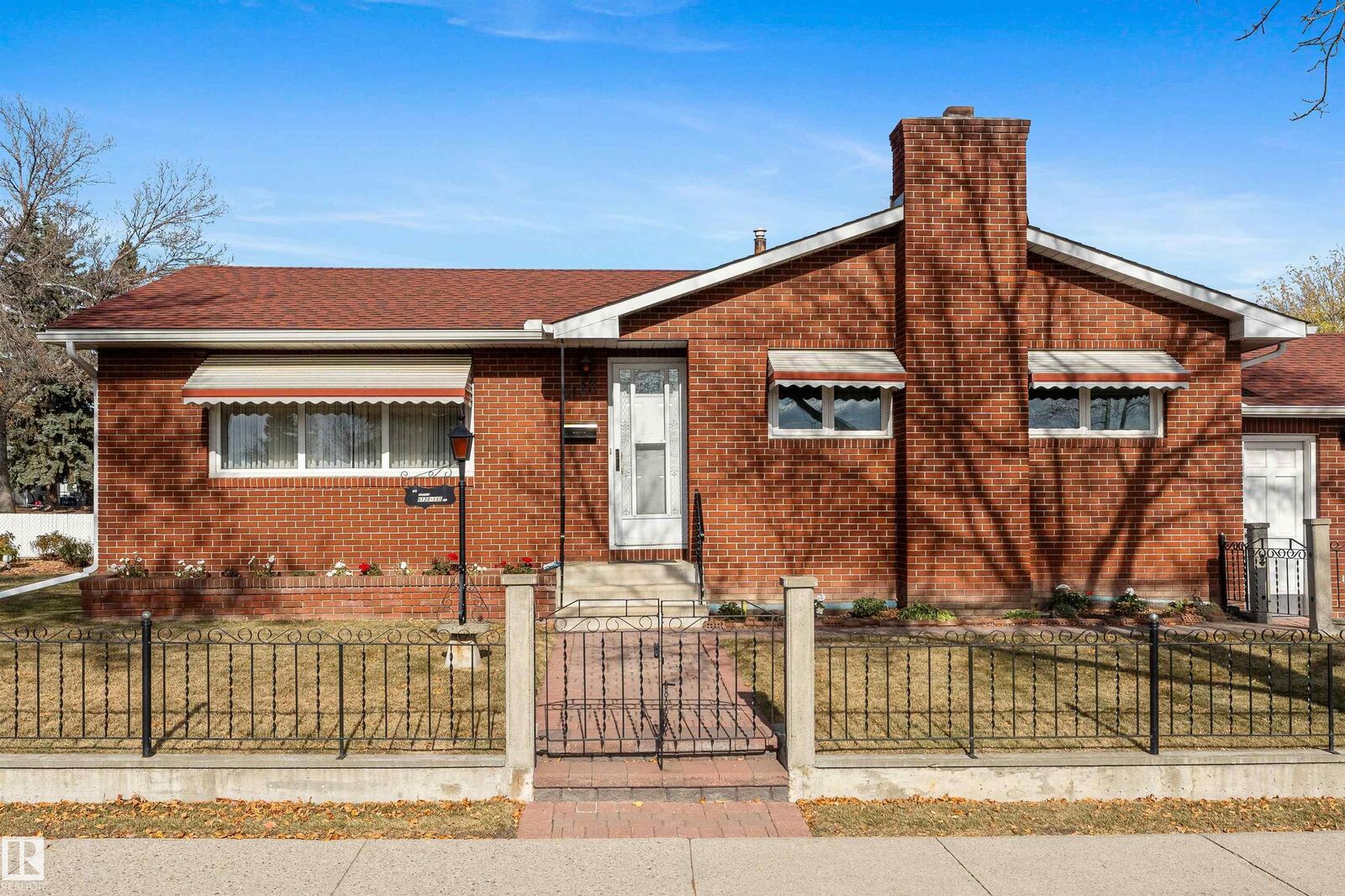 Property Photo: 6128 145 Avenue NW AB T5A 1S8