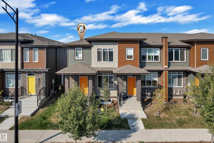 Property Photo: 1448 Keswick Drive SW AB T6W 4T9