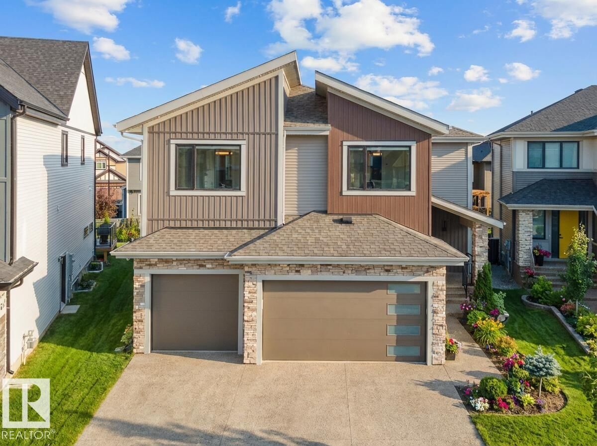 Property Photo: 4118 Ginsburg Place NW AB T5T 4V1