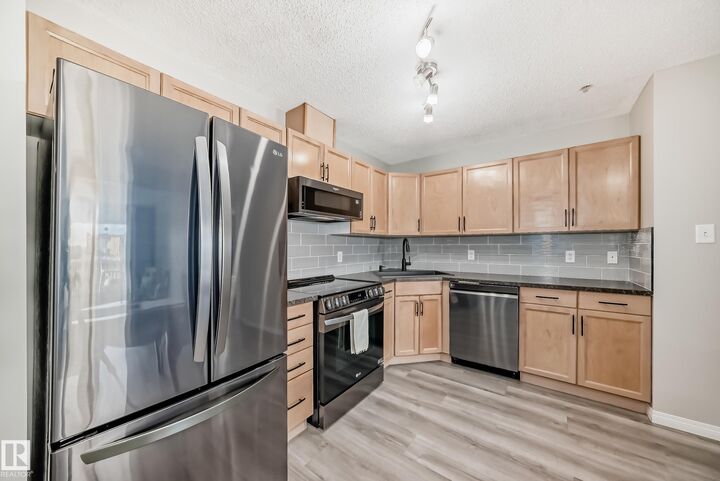 Property Photo: 309 Clareview Station Drive NW 118 AB T5Y 0C5