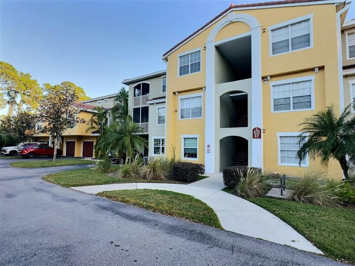 Property Photo: 4751 Travini Circle 4-105 FL 34235