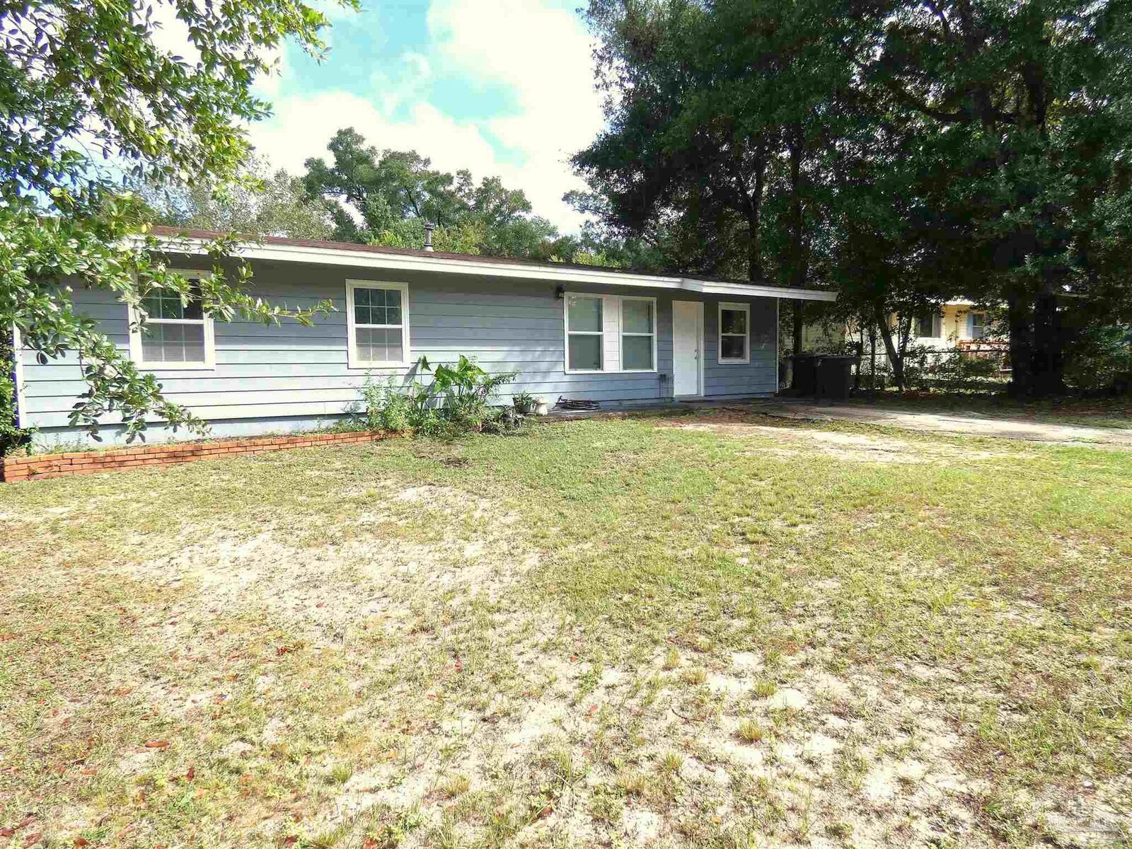 Property Photo:  7704 W Gadsden St  FL 32506 