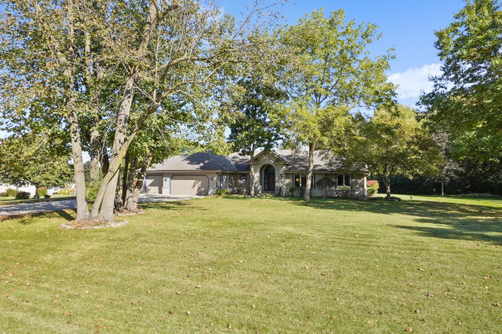 Property Photo:  W254s4980 Gruettner Dr  WI 53189 