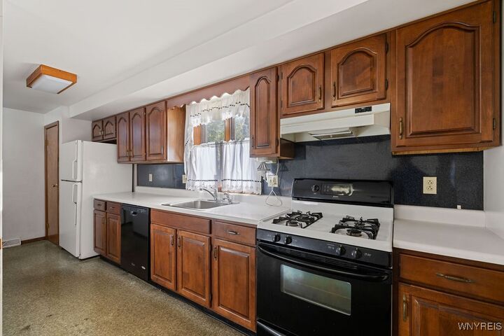 Property Photo: 3210 Woodland Avenue NY 14304