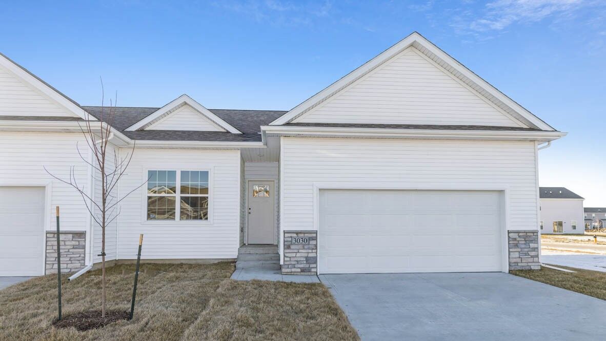 Property Photo: 703 Maddie Lane IA 52340