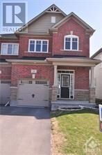 Property Photo:  217 Losino Crescent  ON K2S 1B6